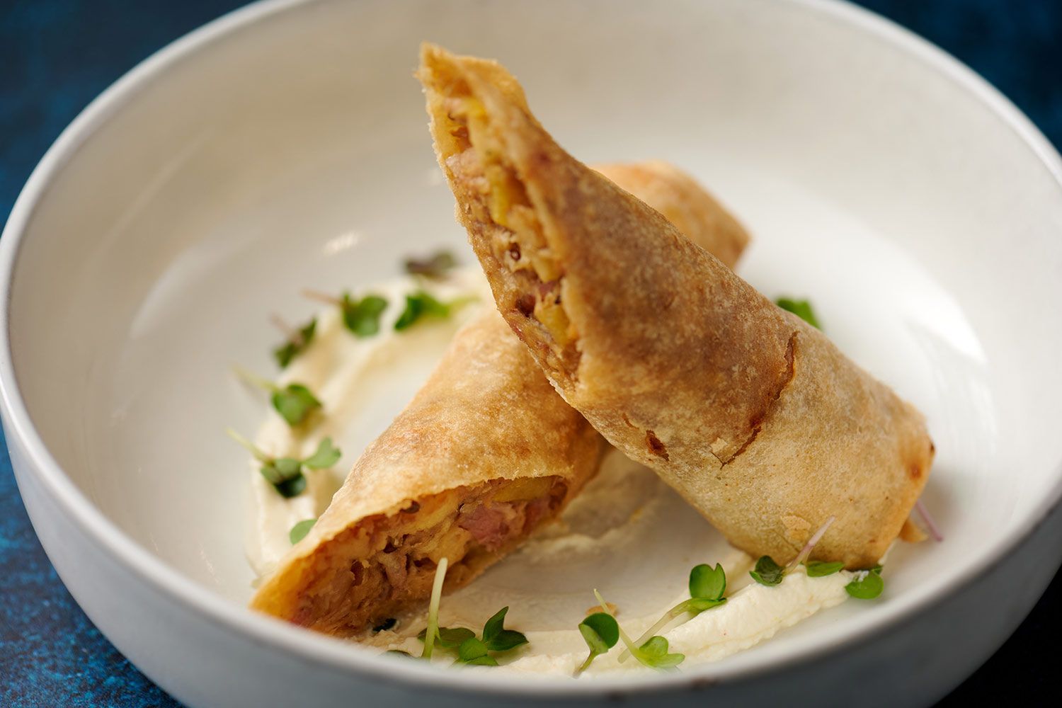 Innviertler Bratl in der Frühlingsrolle vom Wirt z'Kraxenberg